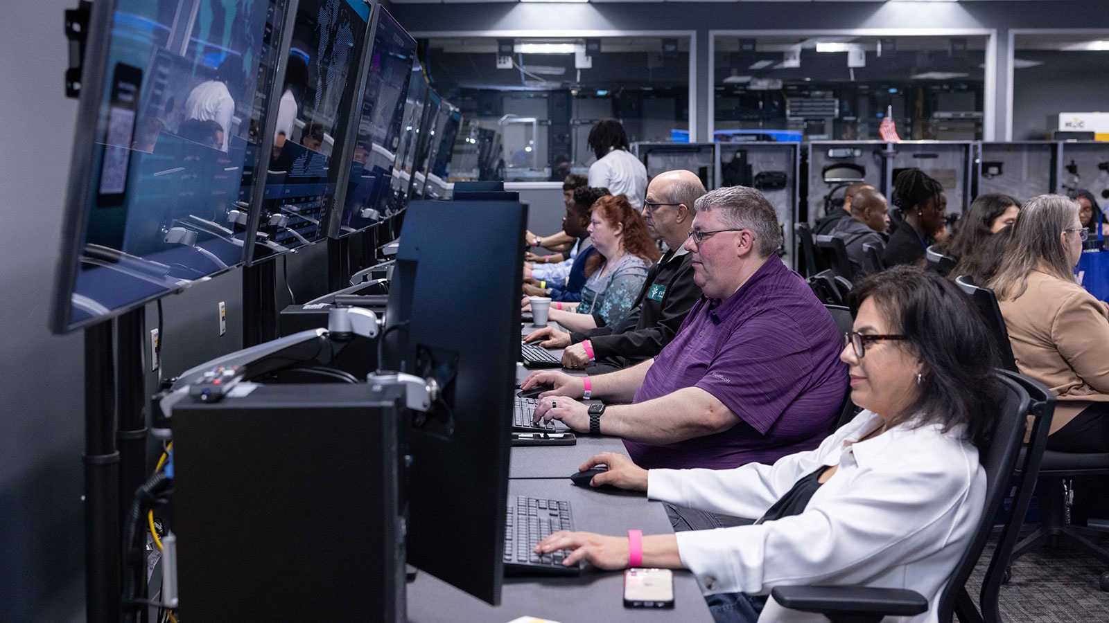 A group a people learning in a lab setting.