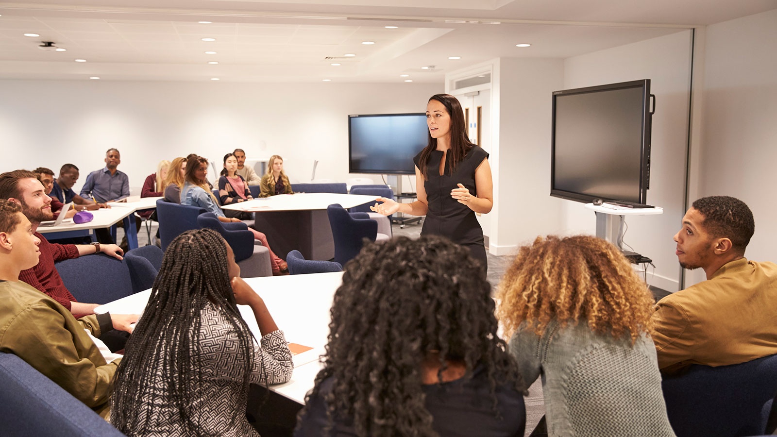 Instructor teaching in a group setting