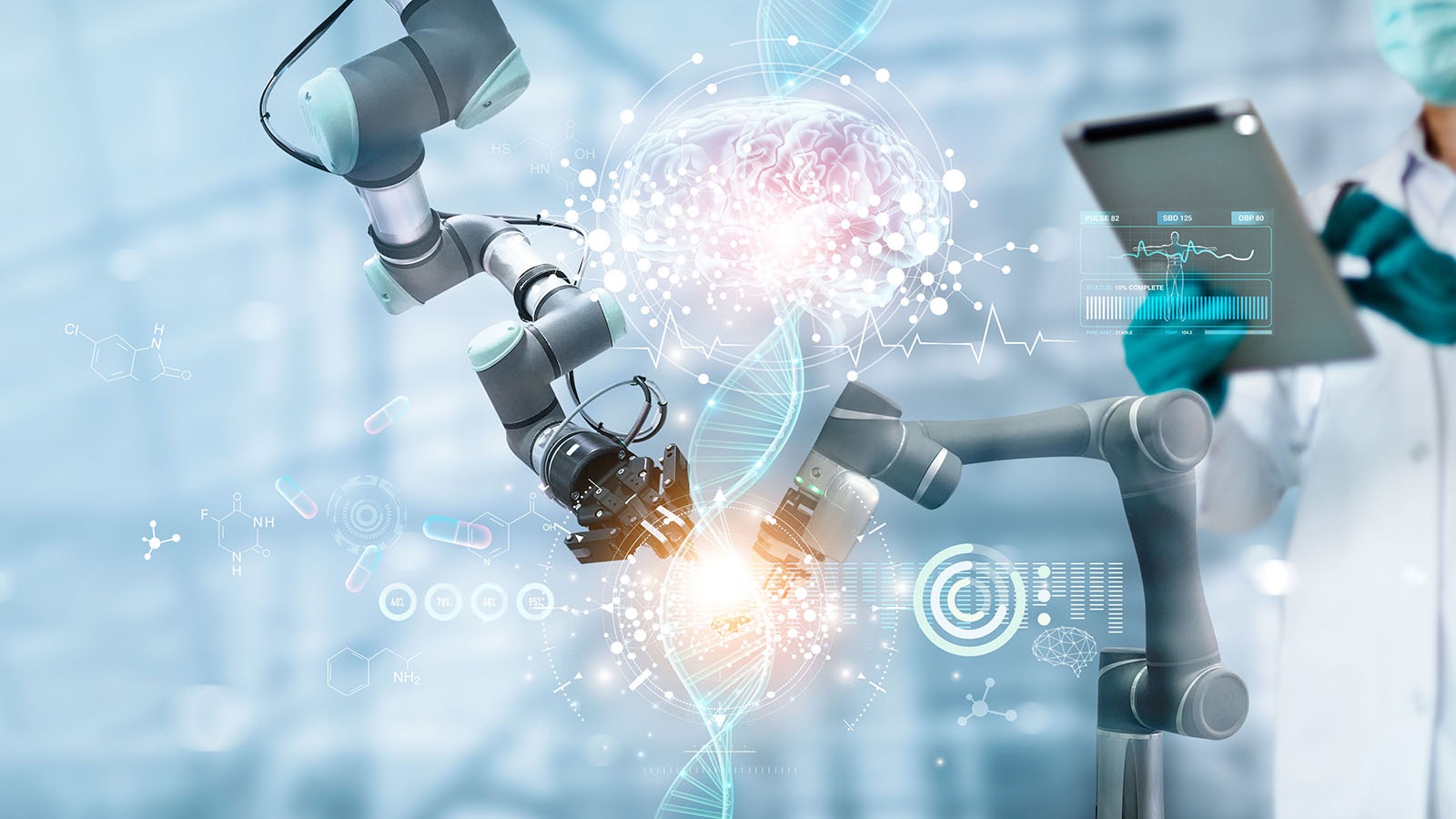 Robotics operator using a tablet to control 2 robotic arms