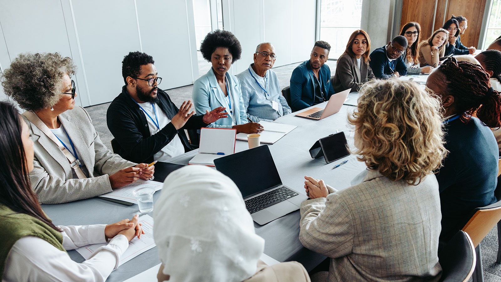 Business executives meeting around a large conference table