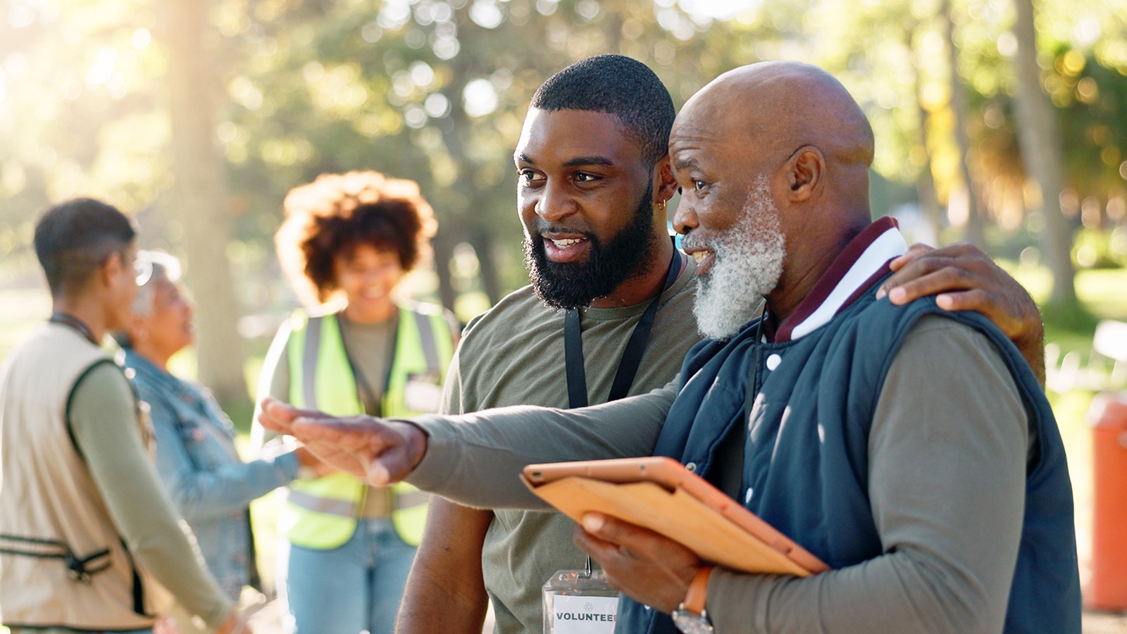 Human Services Technology Instructor giving a lecture to students in a outdoor setting..