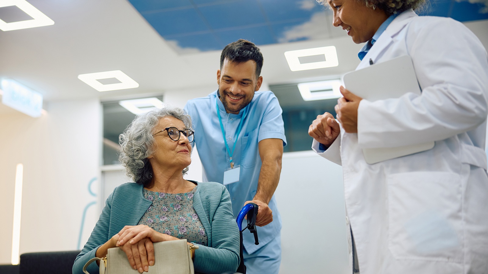 senior woman in wheelchair during a visit at doctor's office