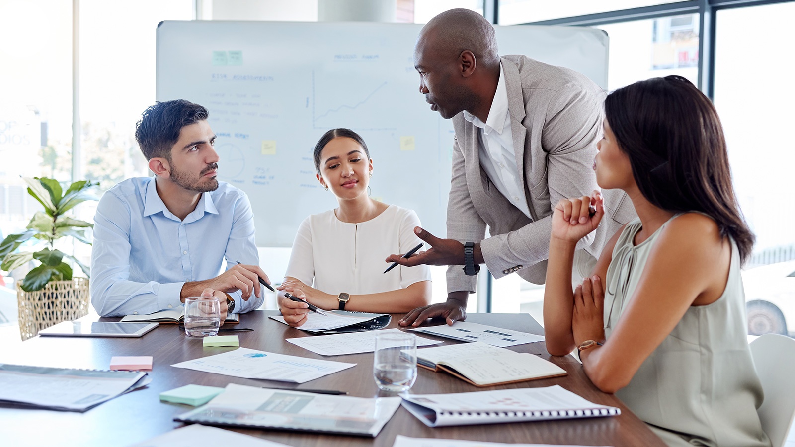 Project management, leadership and planning with business people in meeting for marketing strategy, consulting and teamwork