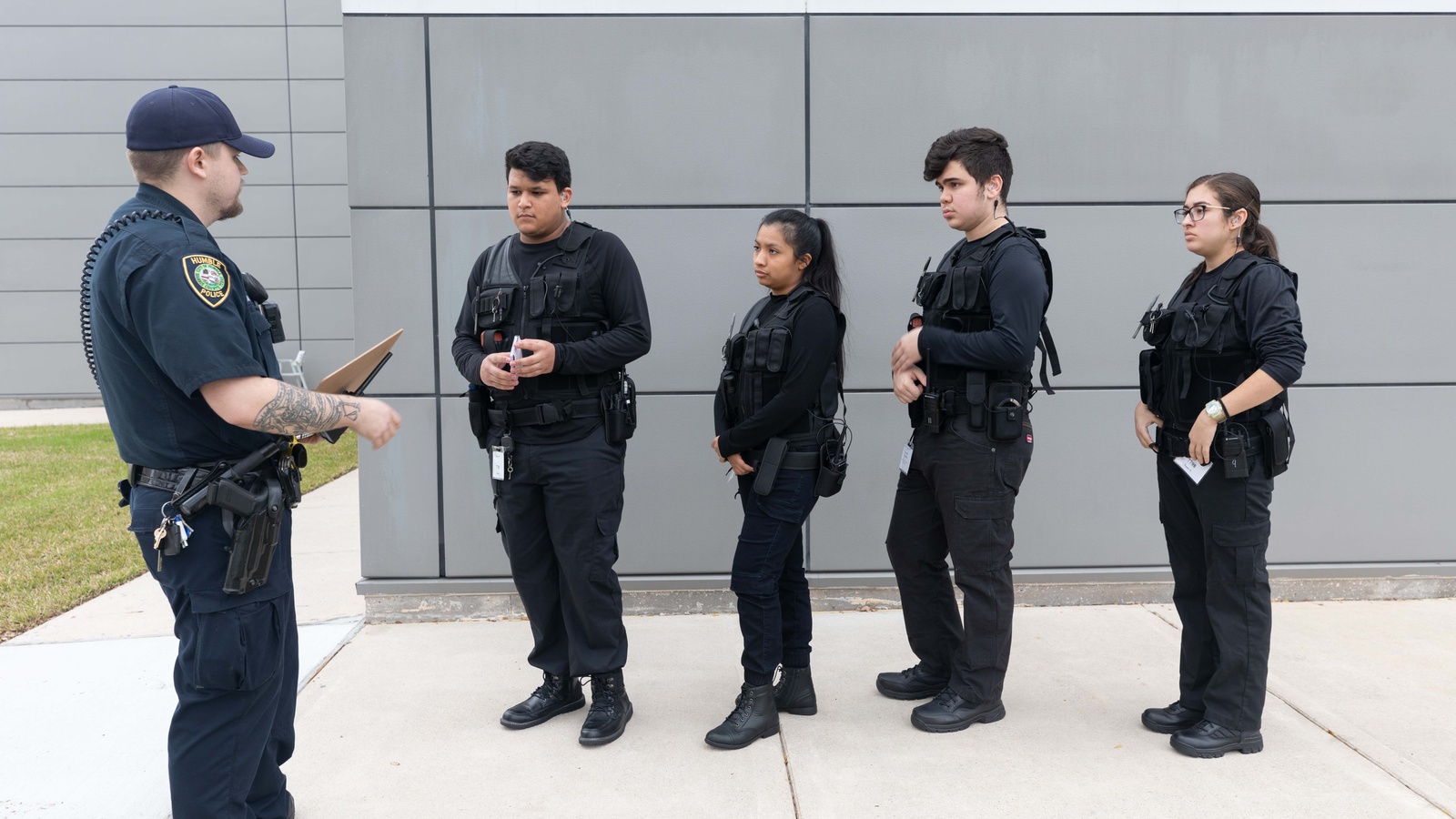 Four cadets with their instructor.