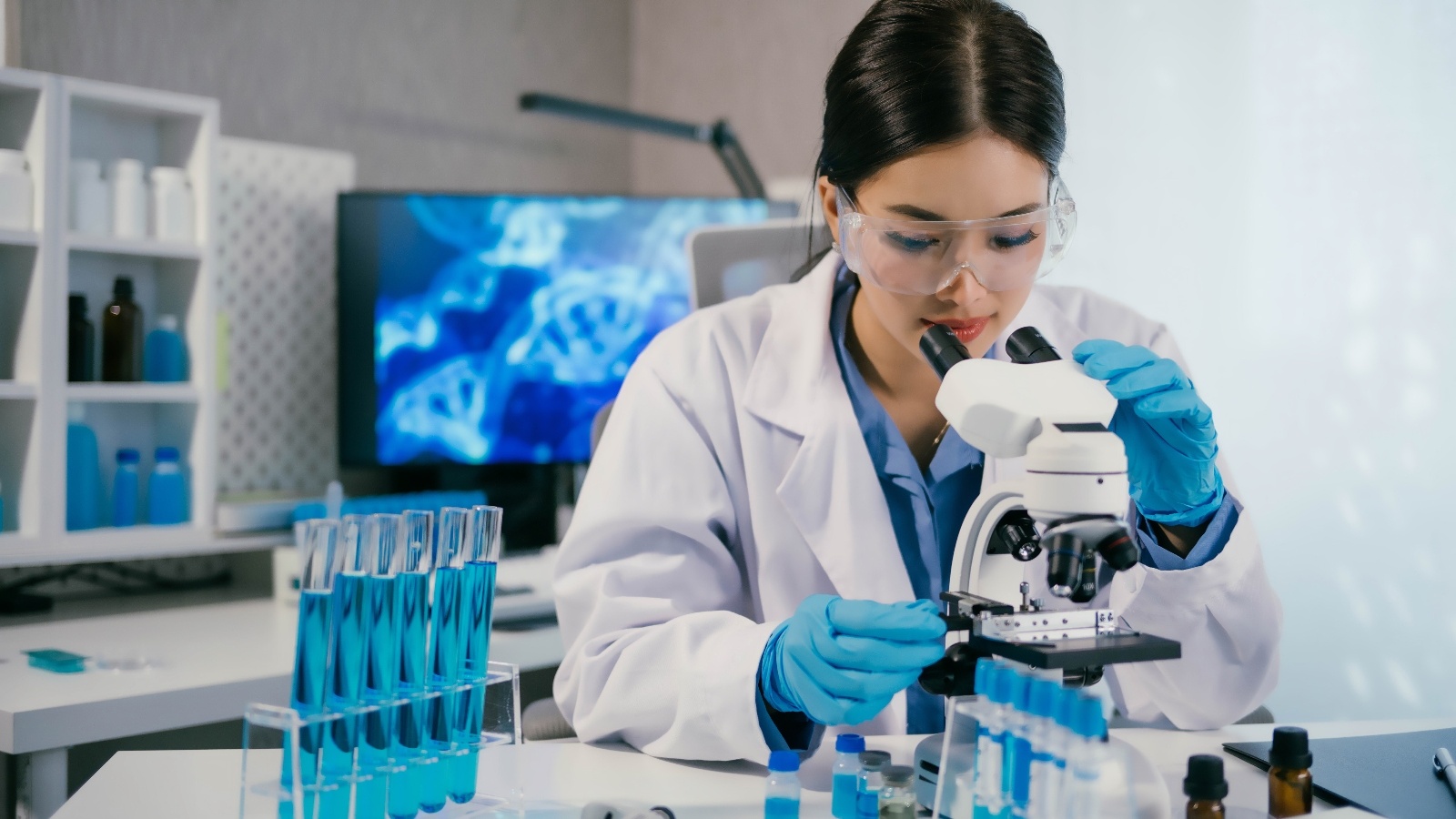 Medical Laboratory Technician students viewing samples on a microscope.