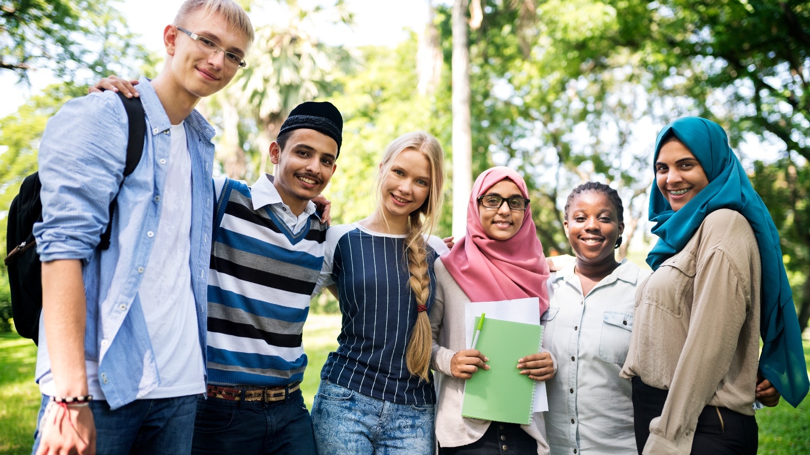 Diverse group of students having a on campus.