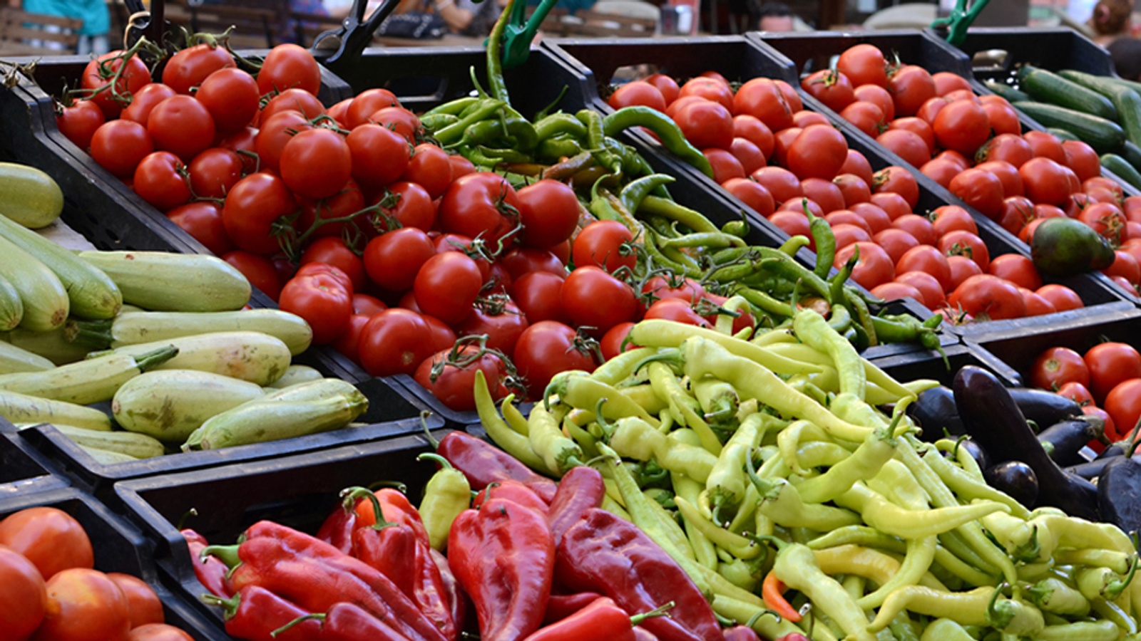 A variety of fresh vegetables in a market