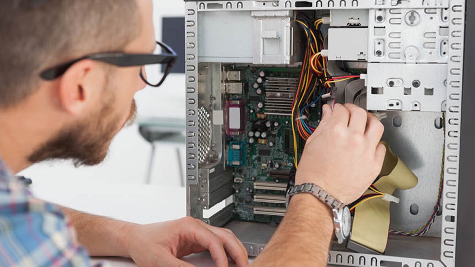 Computer Engineering repairing a computer motherboard