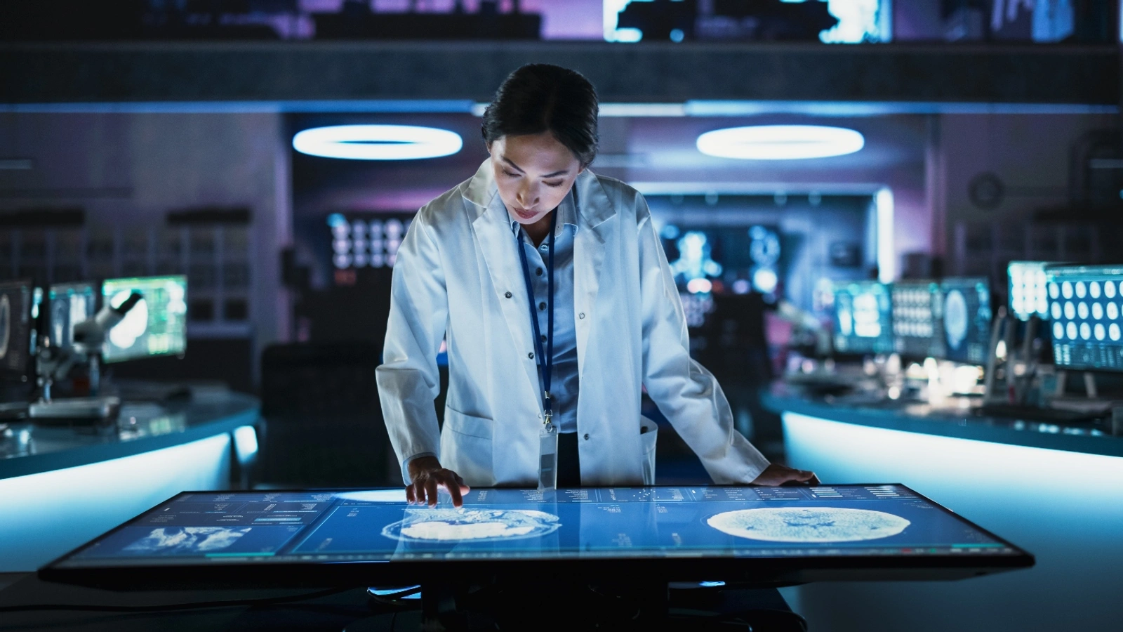 Doctor looking at a patients scans on the computer.
