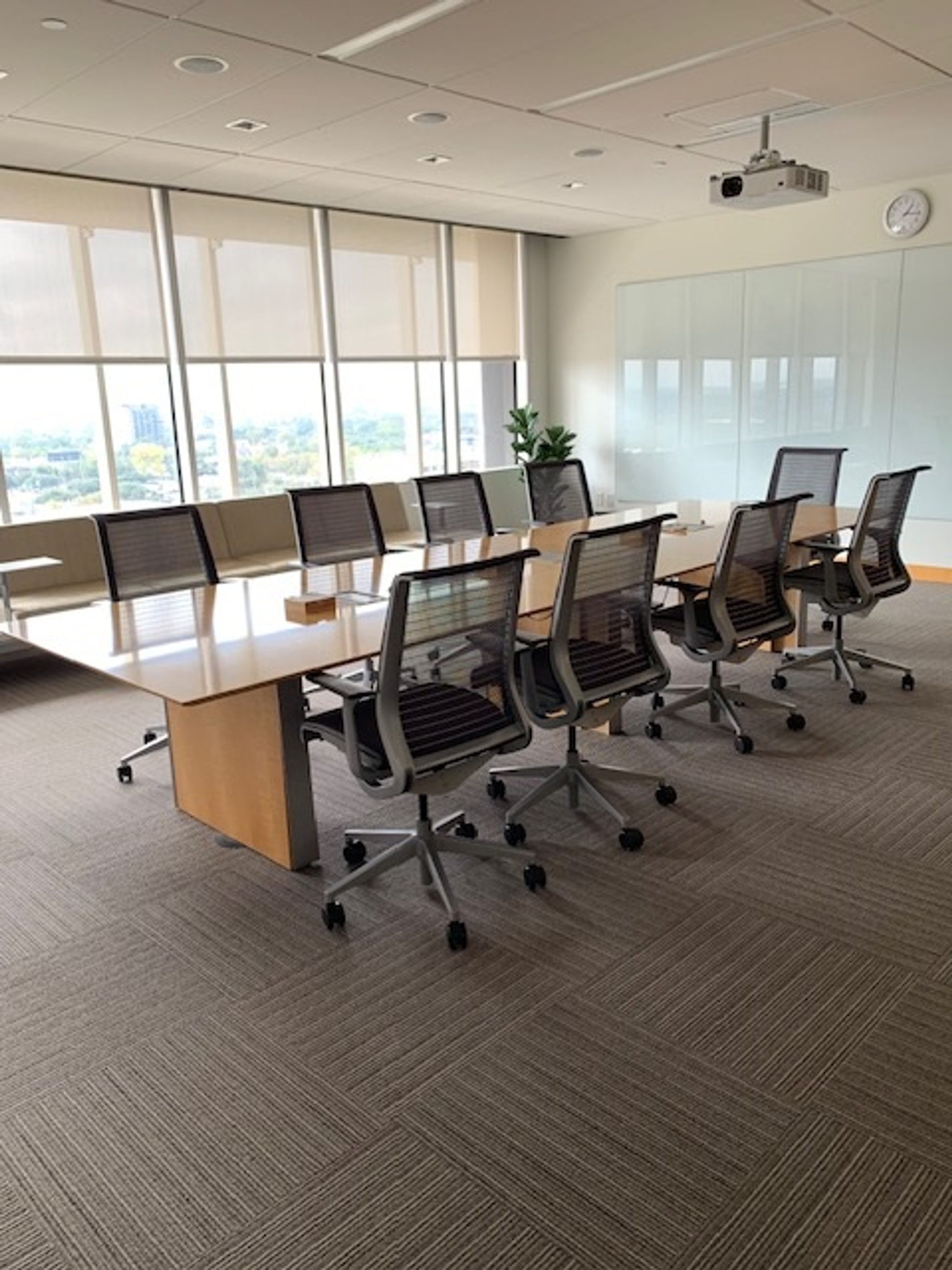 Interior photo of the Arctic Ocean Conference Room featuring long table and chairs
