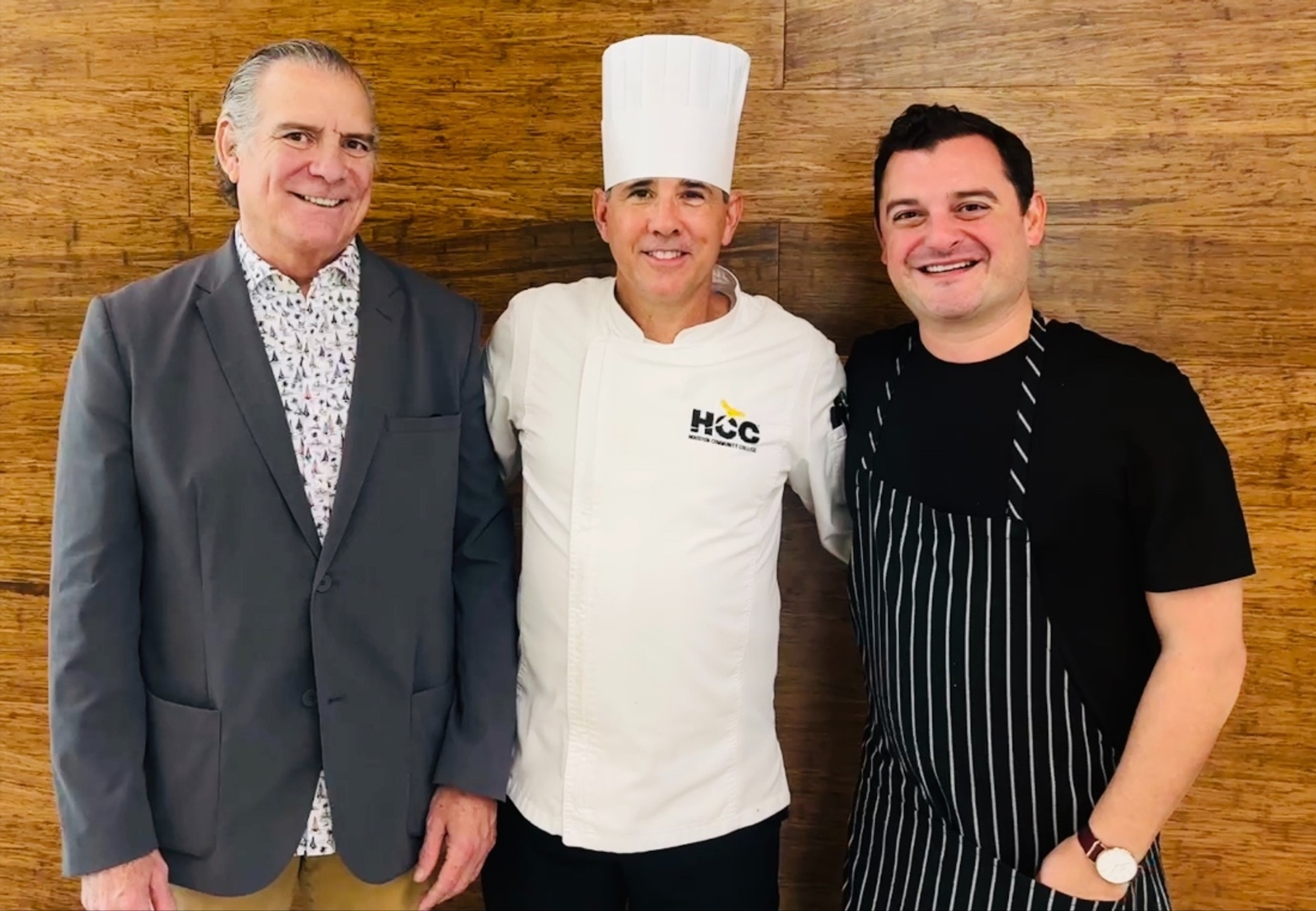 Chefs Michael Cordúa, Carlos Gamboa, David Cordúa pose for a picture at HCC’s Culinary Arts Building.