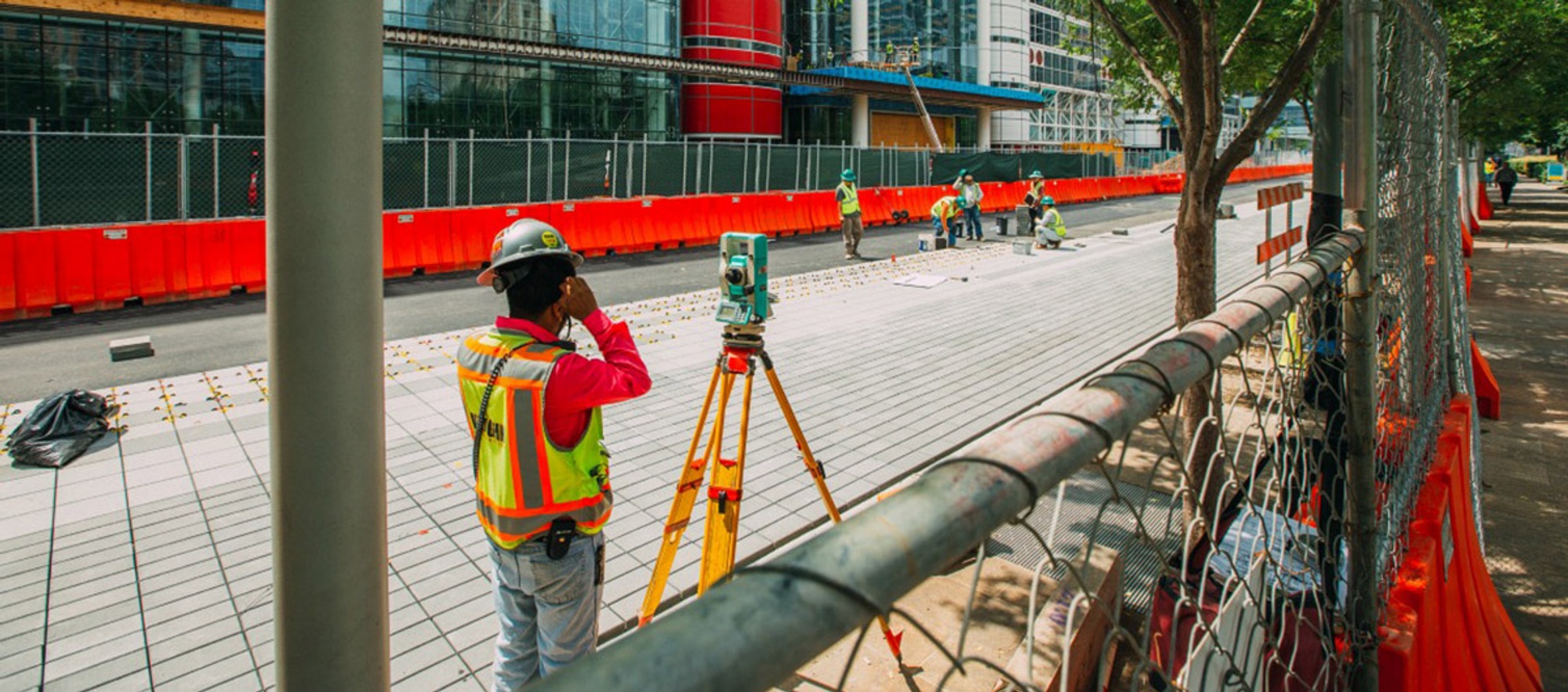Construction employees work on a facility.