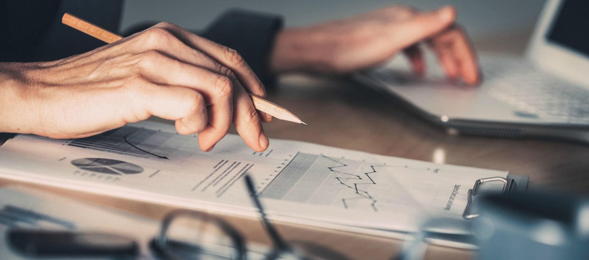 Business professional reading a financial report