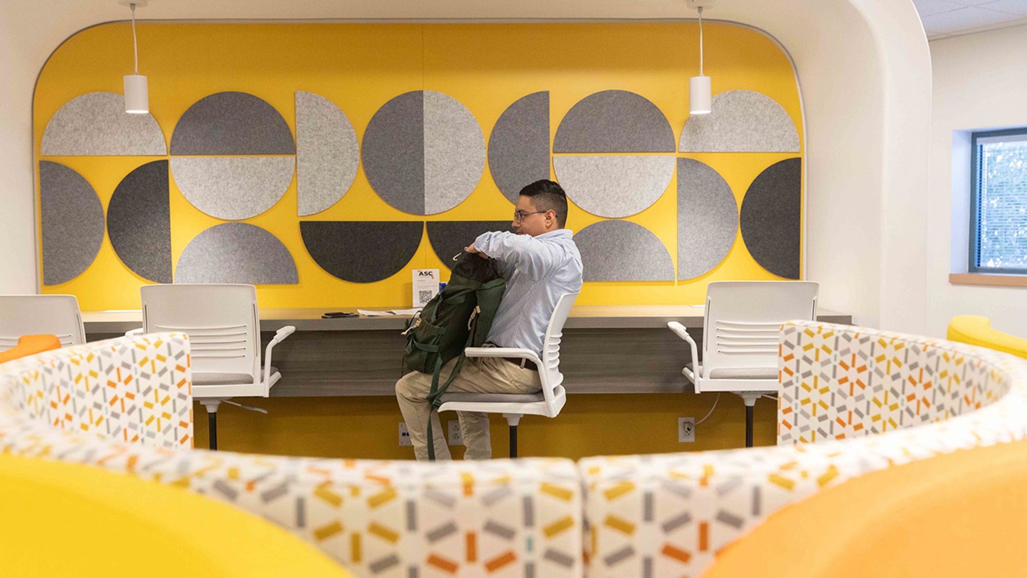 Student using the Digital Access Center lounge