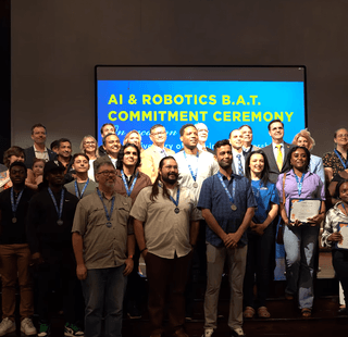 Students accepted into the AI BAT program attending commitment day