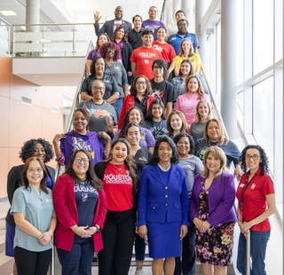Chancellor Margaret Ford Fisher with faculty and staff members