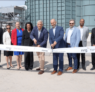 HCC & NRG TH Wharton leadership cutting a ribbon