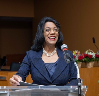 Dr. Margaret Ford Fisher speaking at an event