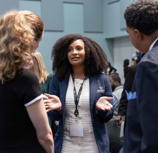 Apprenticeship students socializing at a summit
