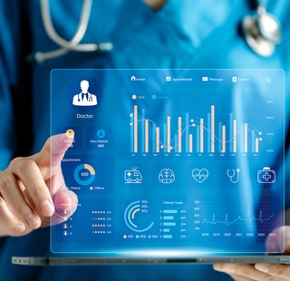 Registered Health Information Technician coding patient data on a medical computer