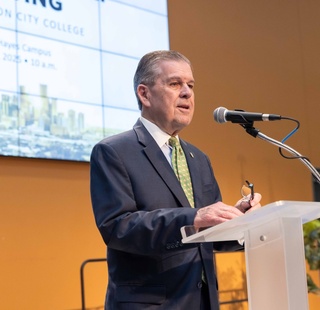 HCC Northwest College president Zachary Hodges speaks during an event.