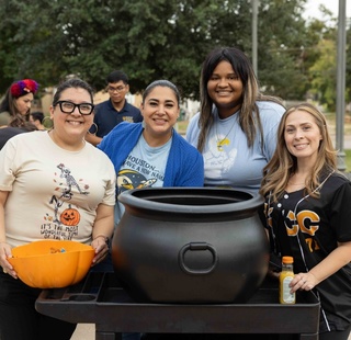 HCC students pose for a photo during a Halloween-themed event at HCC Southeast College.