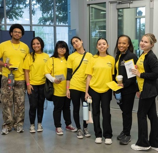 HCC Coleman College for Health Sciences students pose for a photo during Simulation Day at Coleman College.