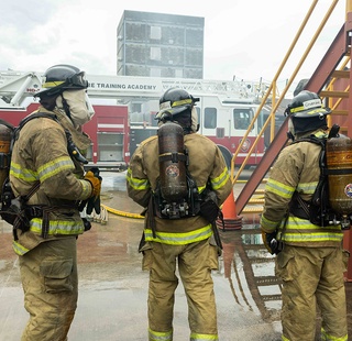HCC Fire Academy students training at the fire academy