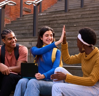 Student celebrating success on campus