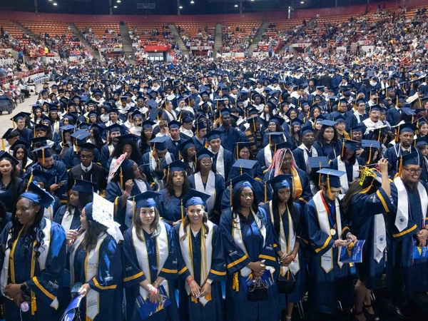 HCC graduates smile during the 2026 Commencement Ceremony.