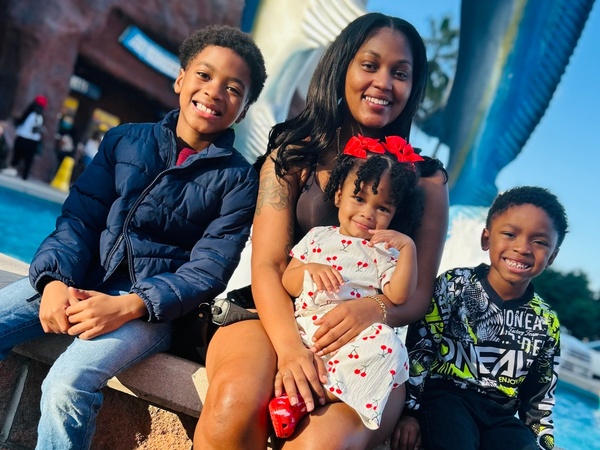 Jeromecia Brantley poses for a photo with her three children.