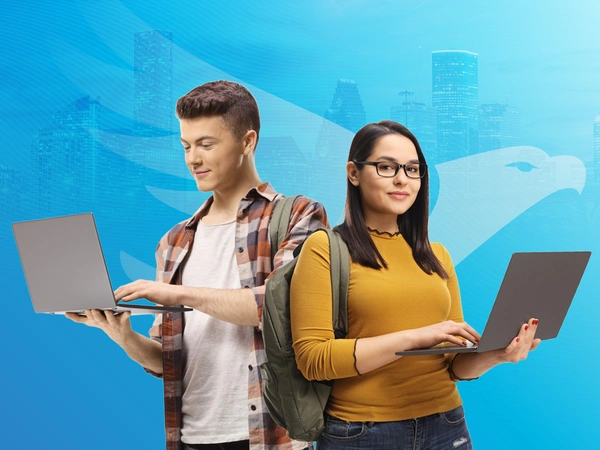 HCC students holding laptops