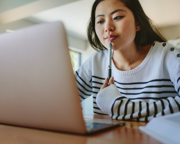 Female student using her laptop
