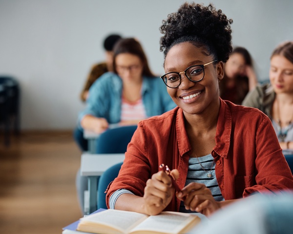 A female student sitting in class