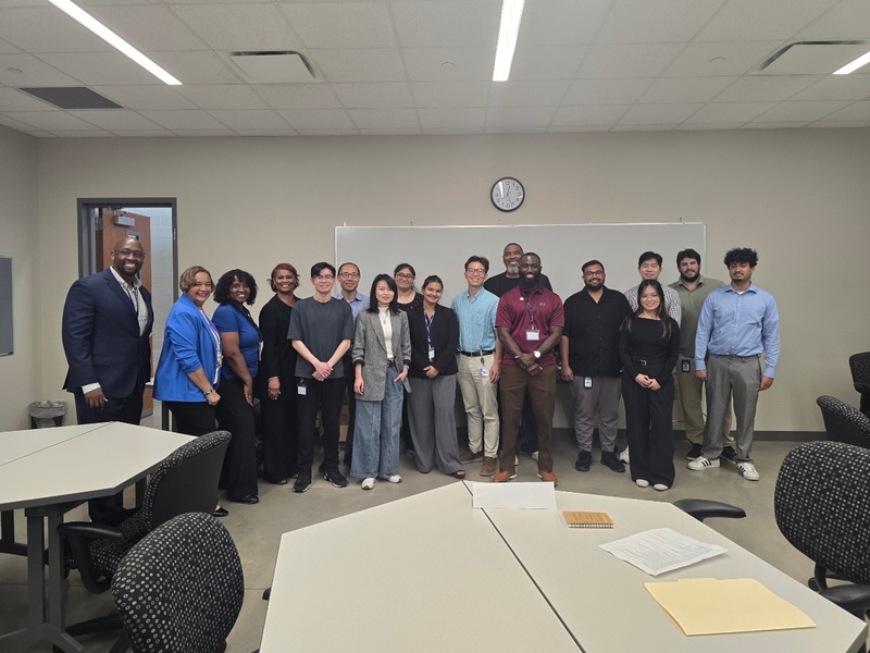 HCC officials and students smile during the Foxconn Hiring Event.