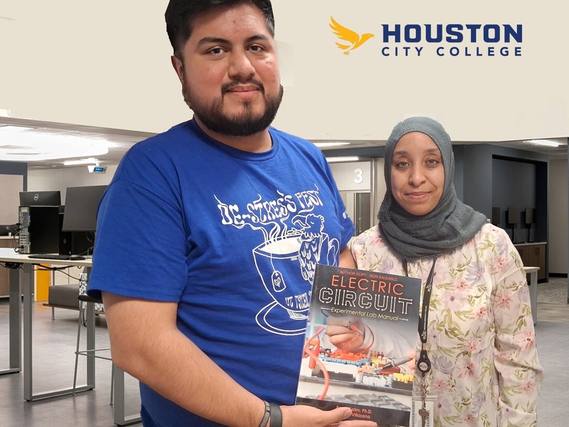 HCC student Hector Villasana and full-time faculty member Dr. Reem Salim display the experimental lab manual that they wrote.