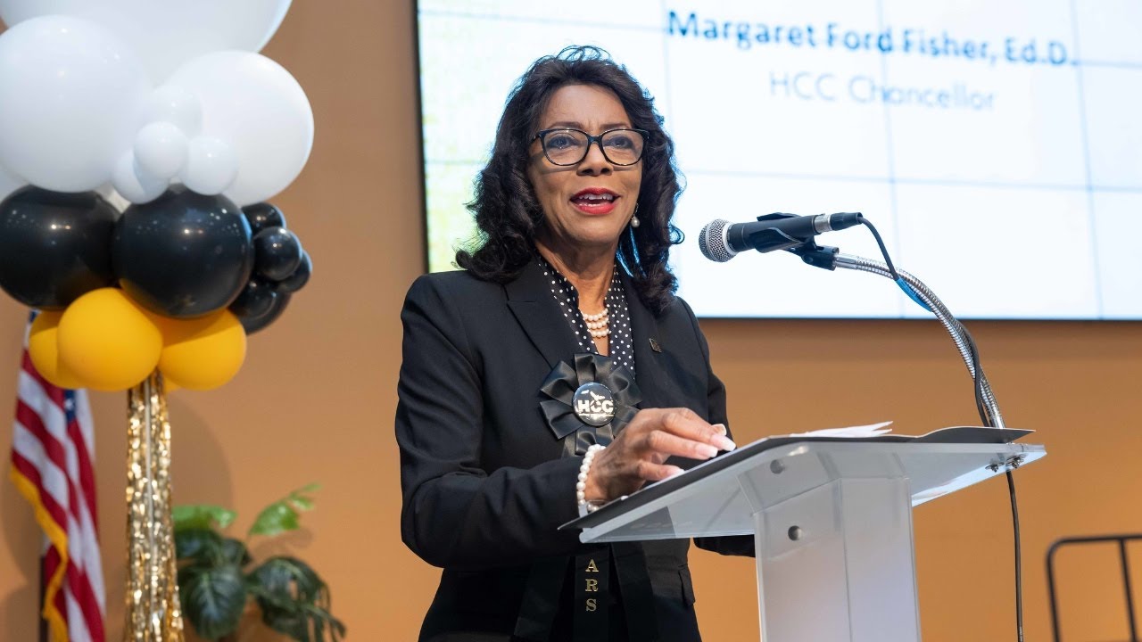 Chancellor Margaret Ford Fisher speaking after receiving 40 year service award